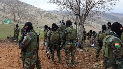 FILE PHOTO: Iranian Kurdish fighters from the Kurdistan Freedom Party (PAK) take part in a training session at a base on the outskirts of Erbil